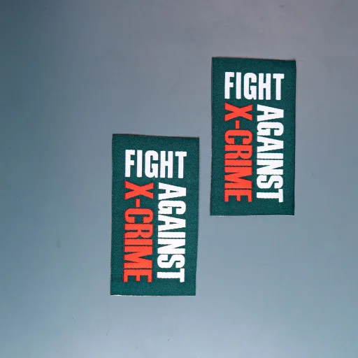 Label woven Fight Against X-Crime